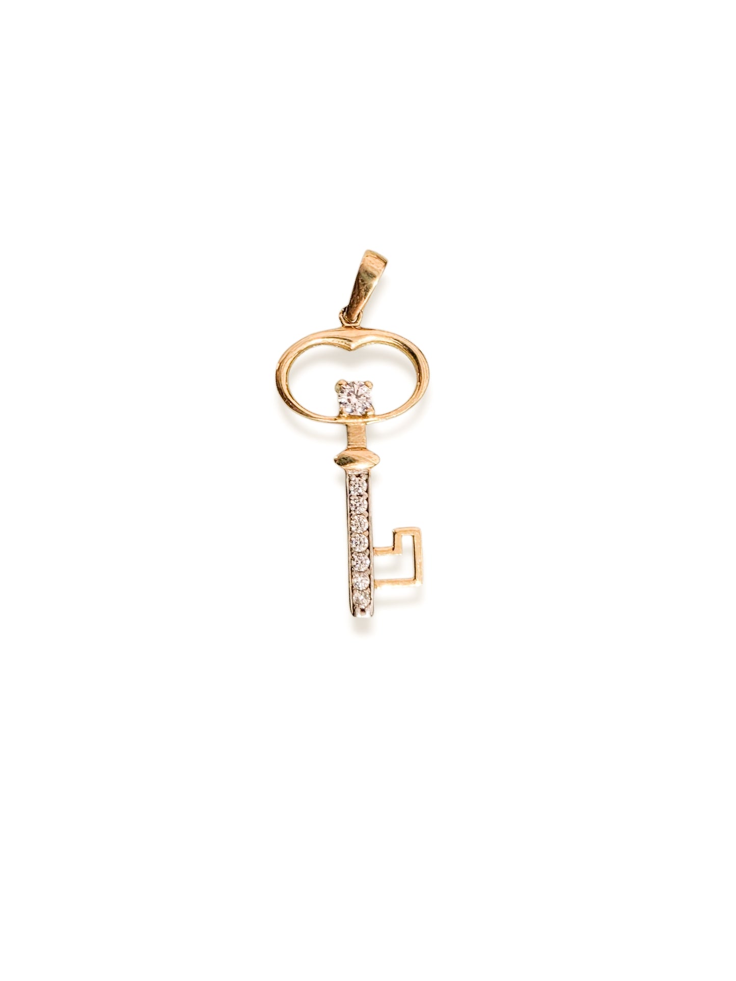 Dije llave con piedras oro 10k