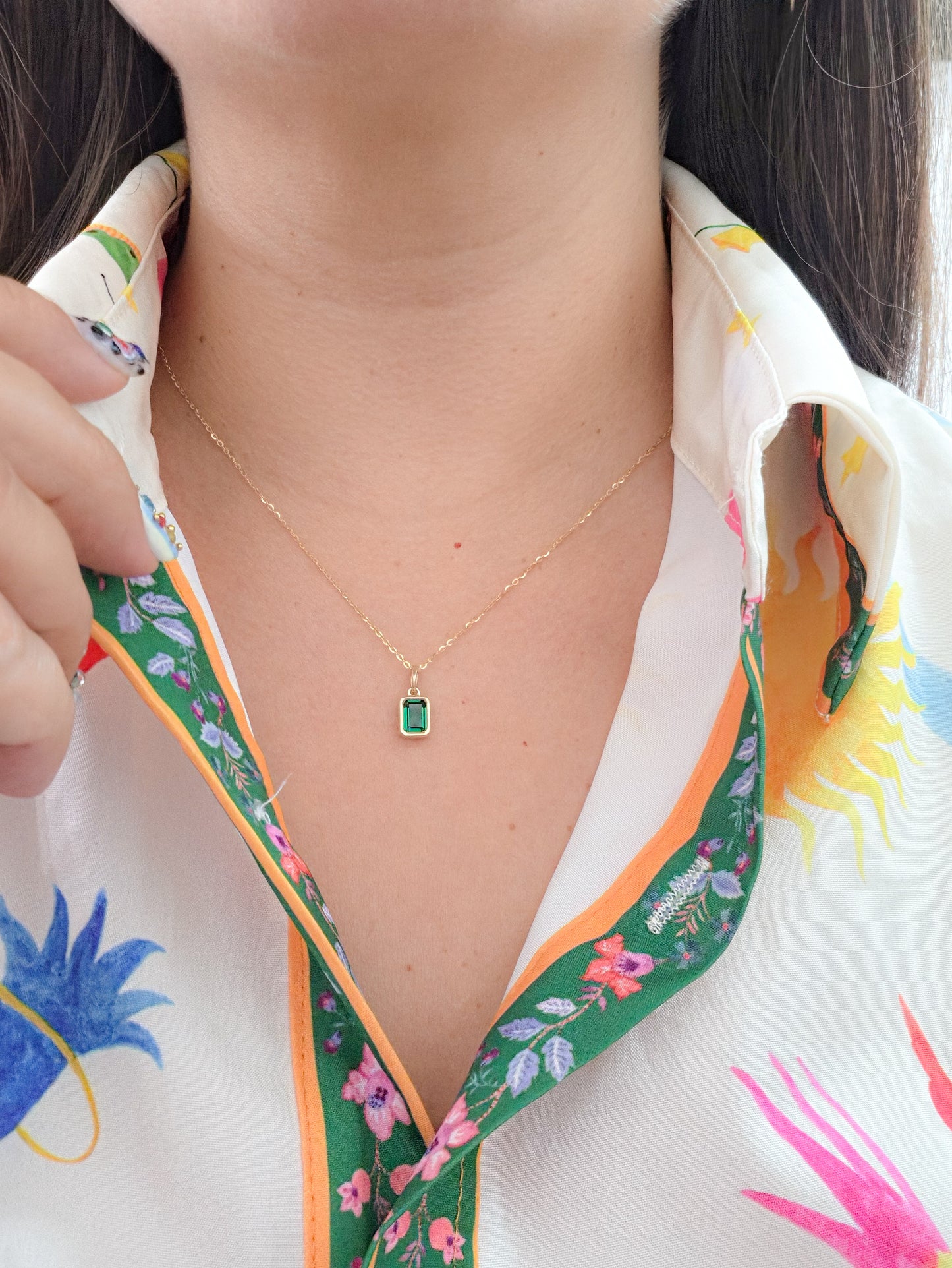Dije con zirconia verde oro 10k