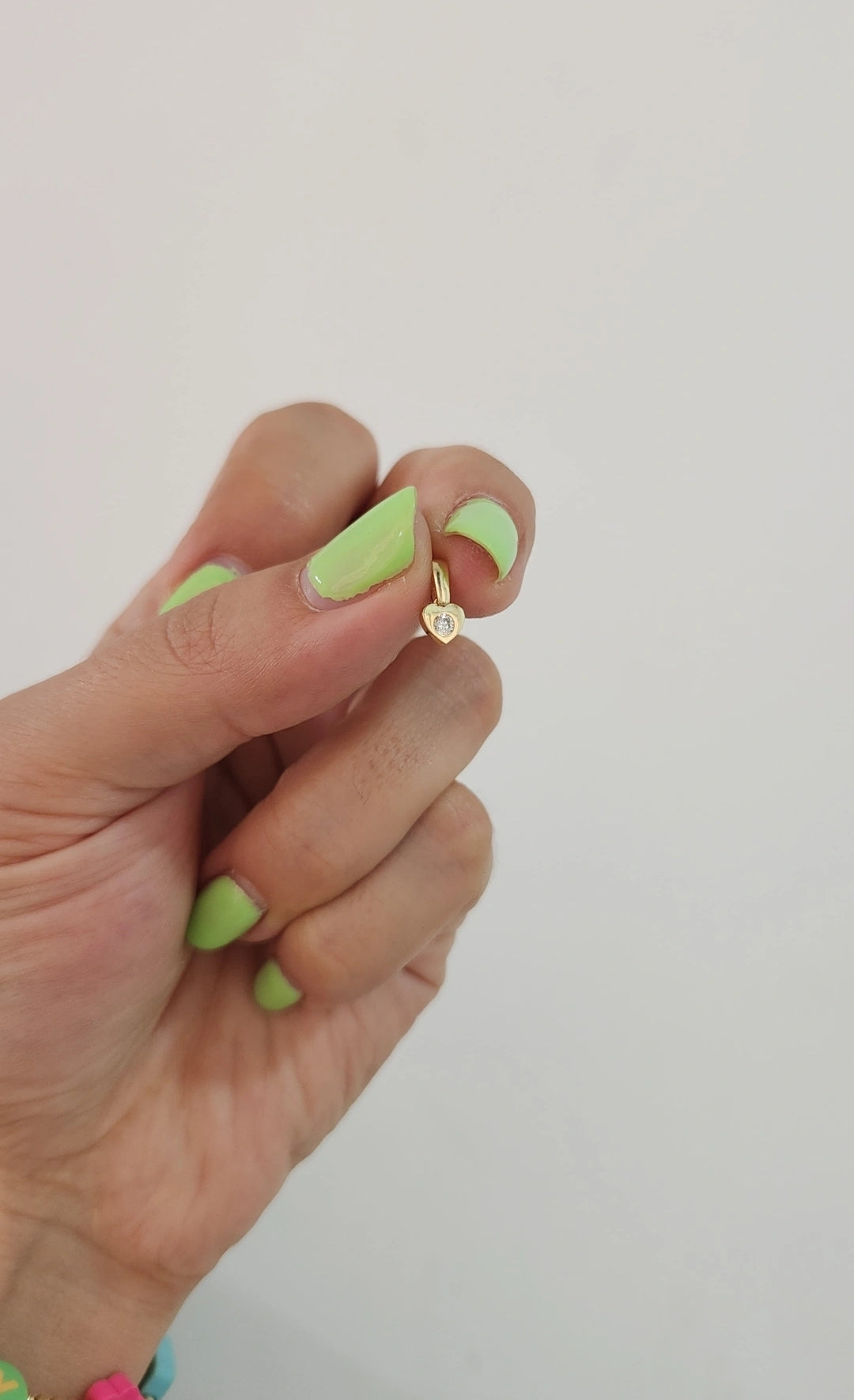 Dije mini corazón 2 con piedra oro 10k