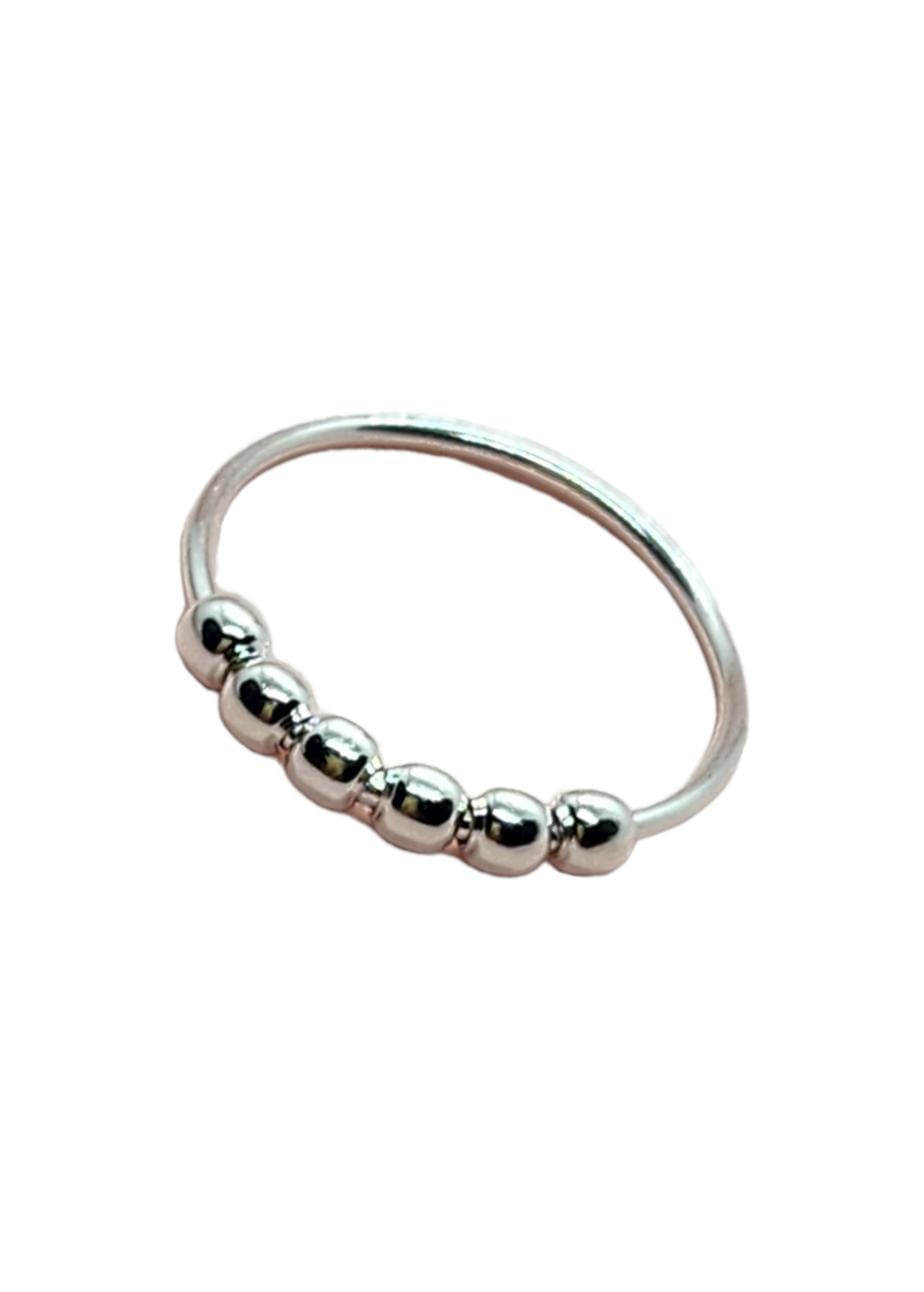 Anillo de bolitas giratorias (anti-estrés)