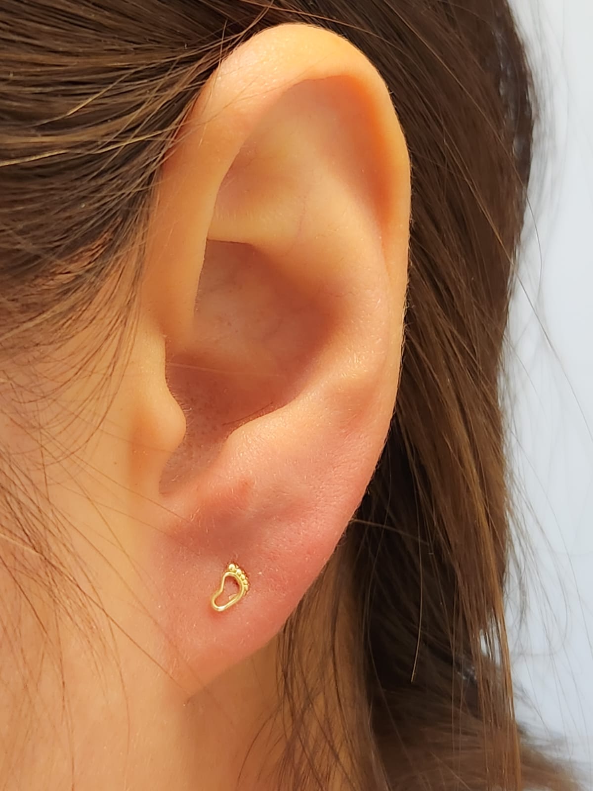 Par de Broquel mini pie silueta