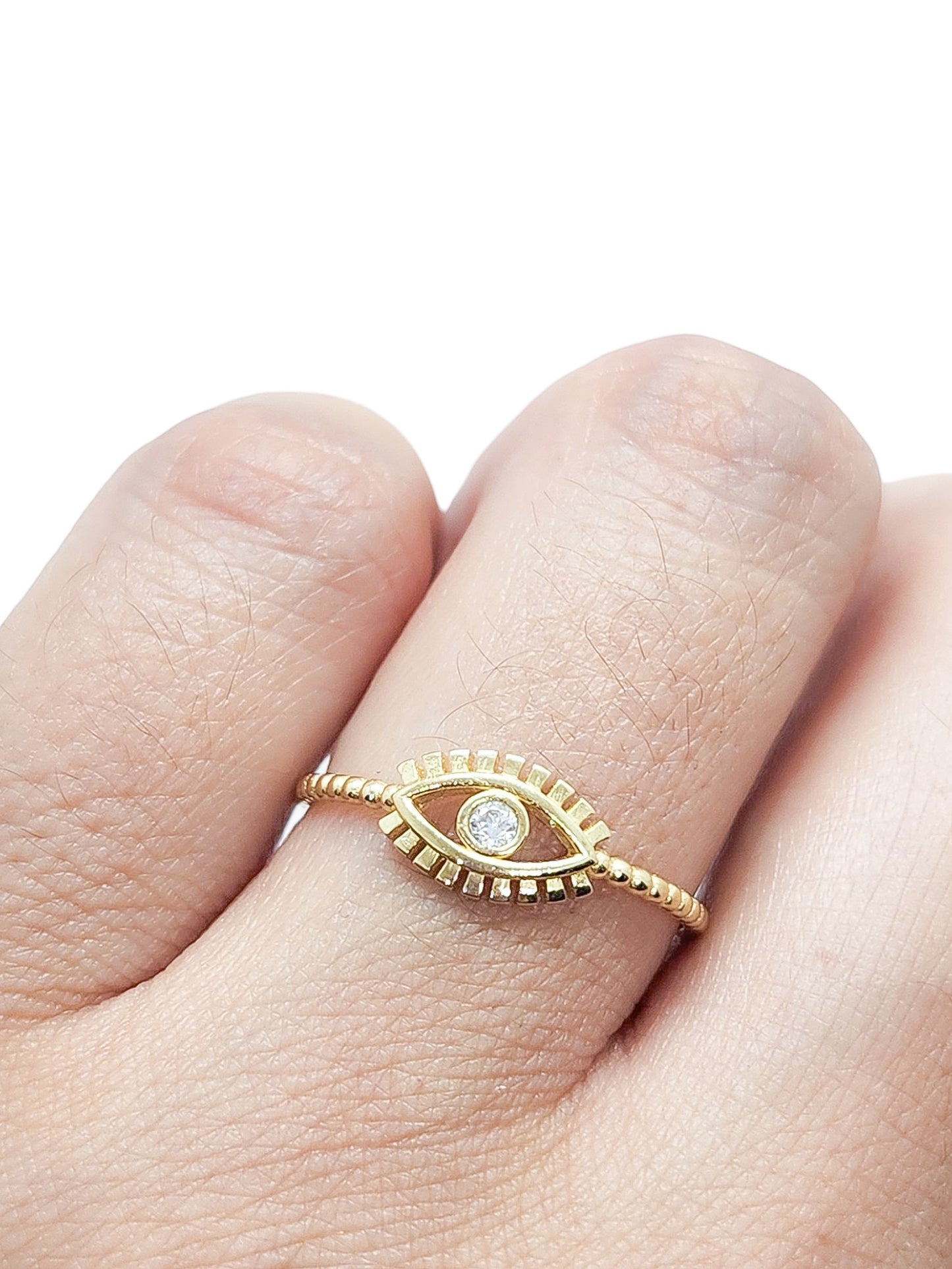 Anillo ojo turco bolitas piedra blanca oro 10k