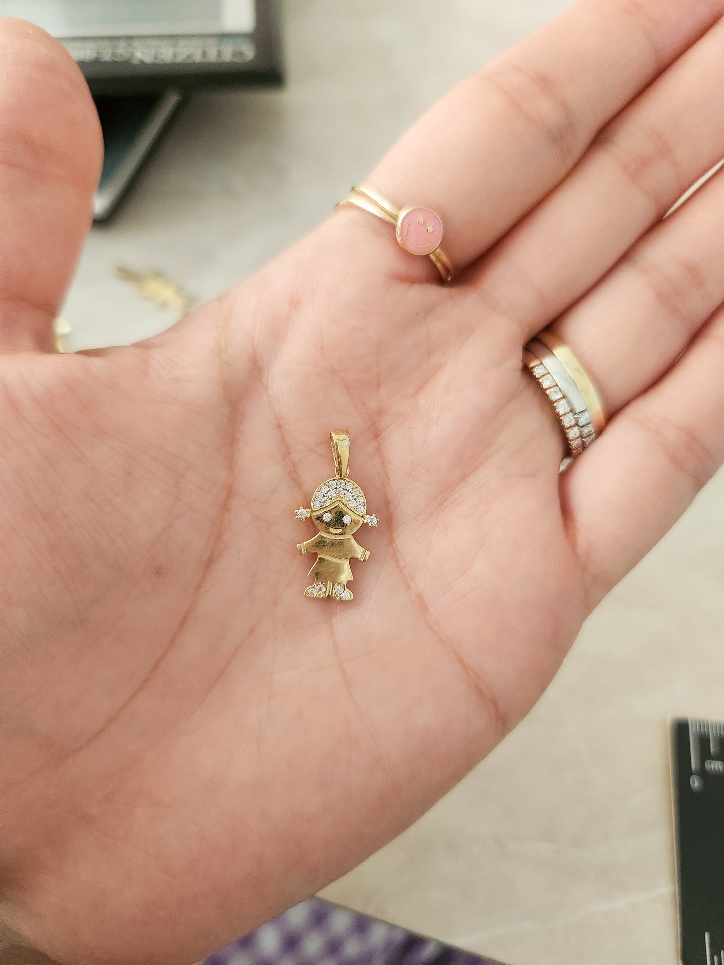 Dije niño con zirconias blancas 10k