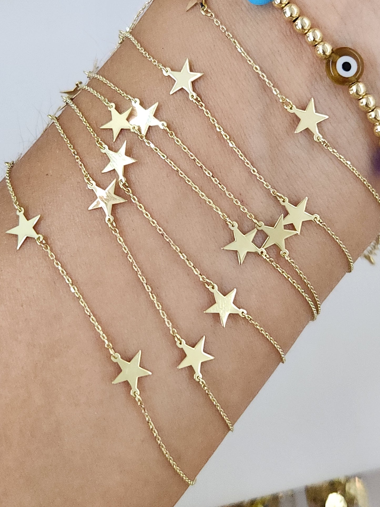 Pulsera estrellas oro 10k