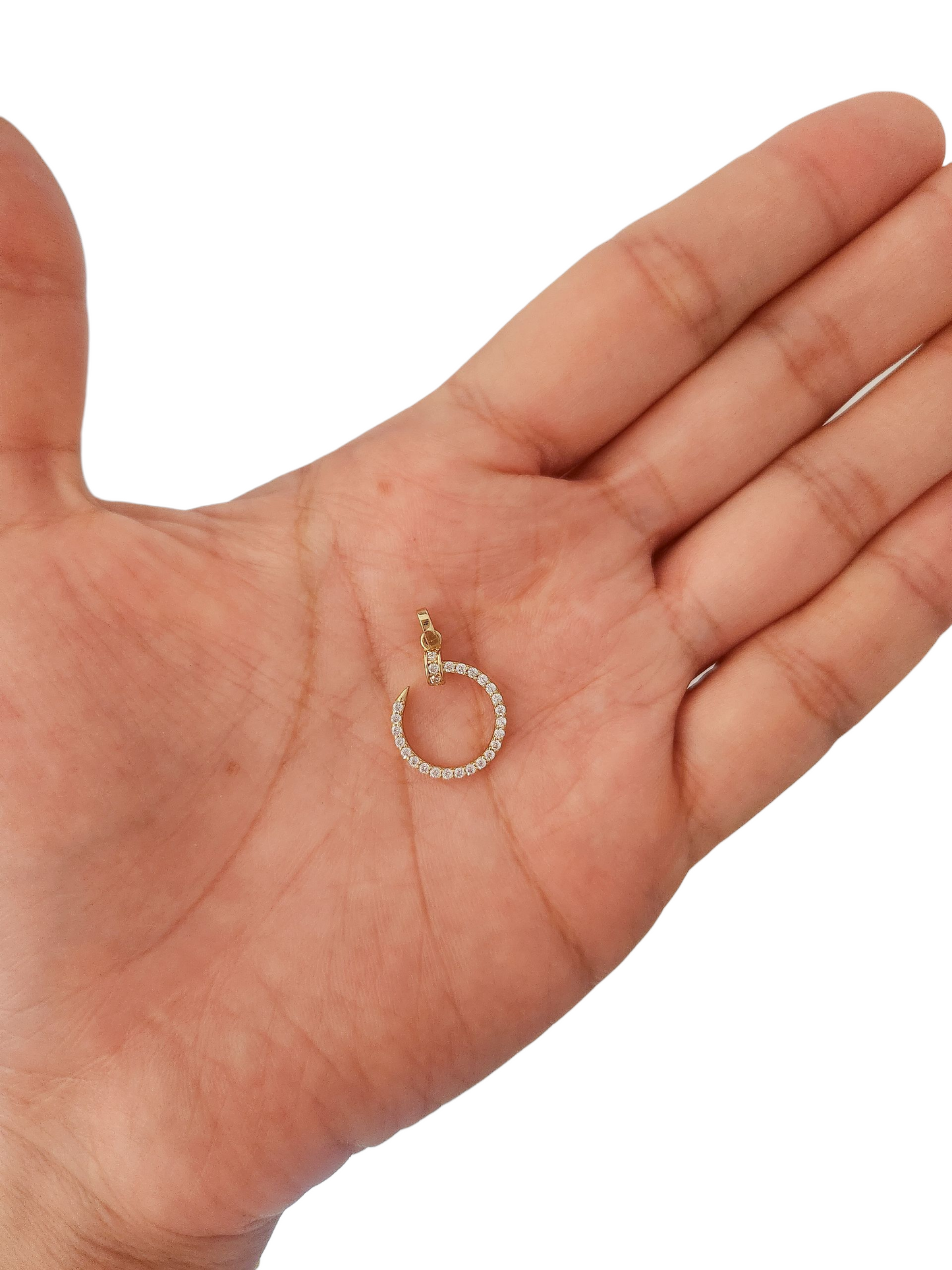 Dije clavo con piedras blancas oro 10k