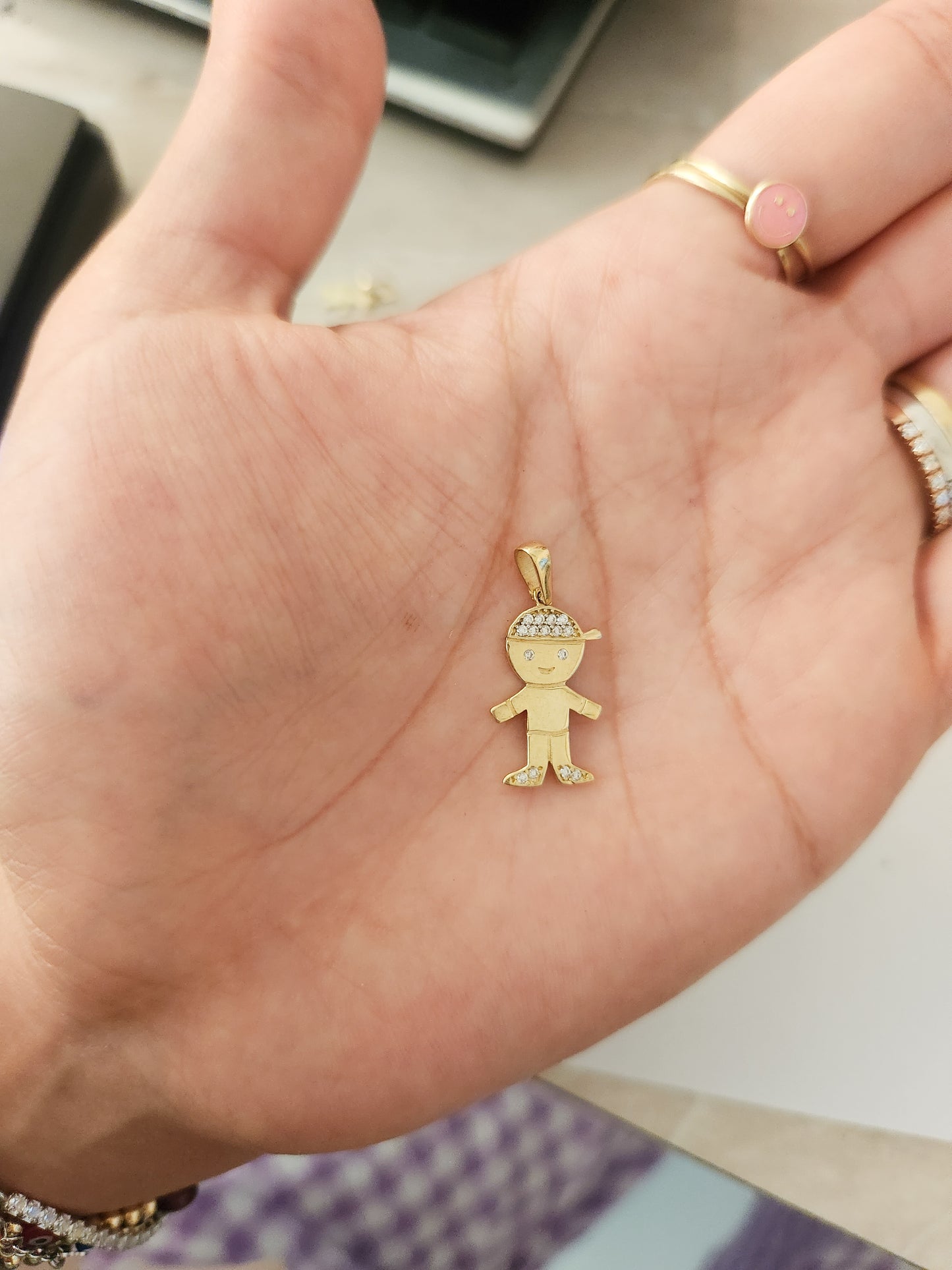 Dije niño con zirconias blancas 10k