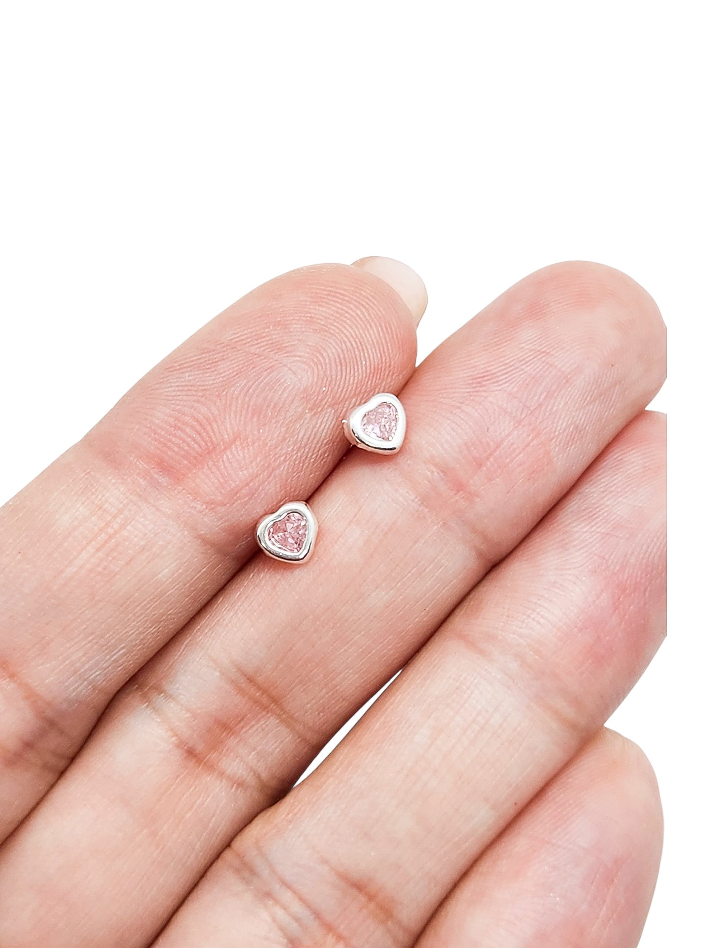 Par de broqueles biselados corazón rosa plata 925