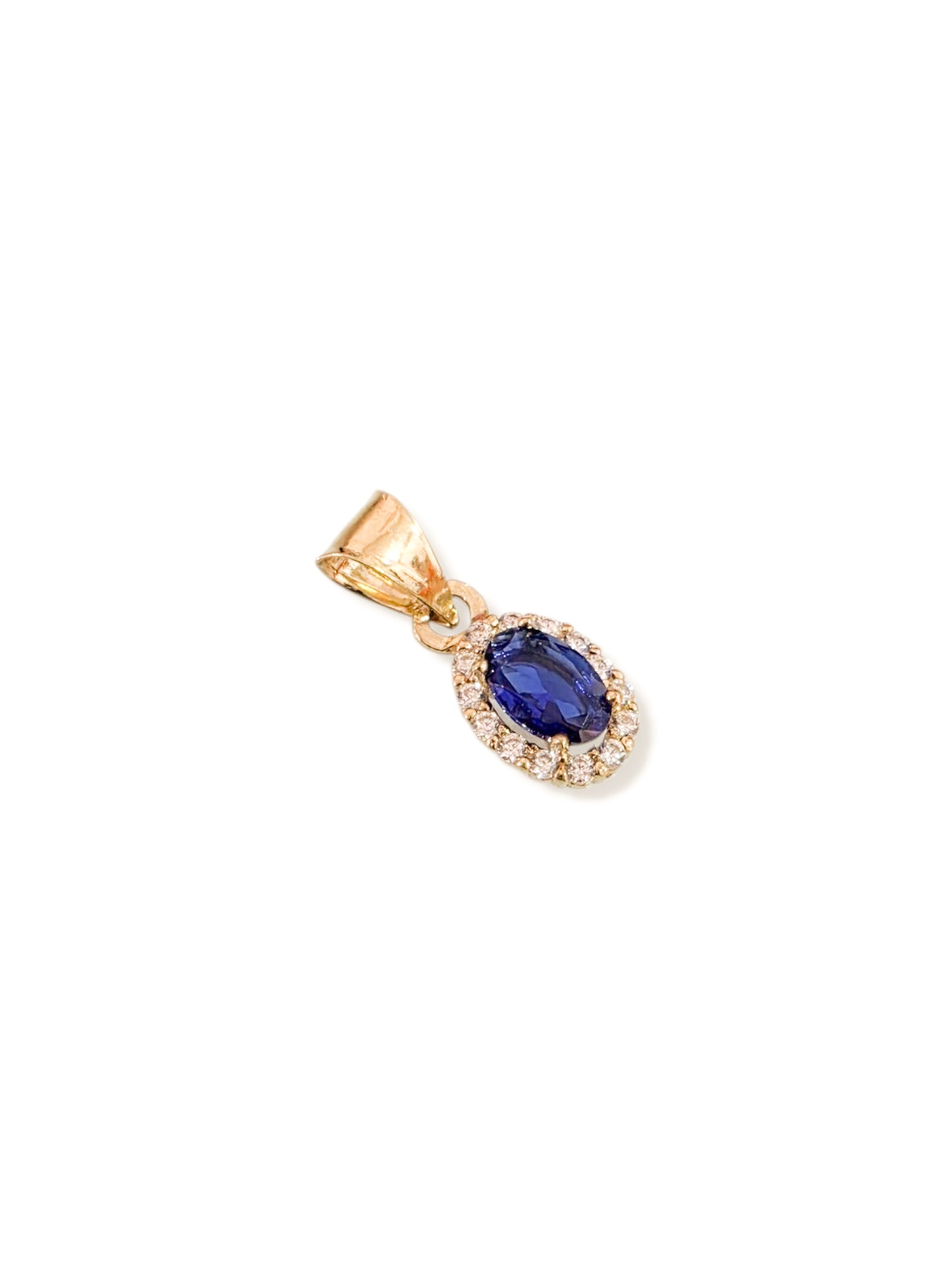 Dije corte oval con zirconia azul oro 10k