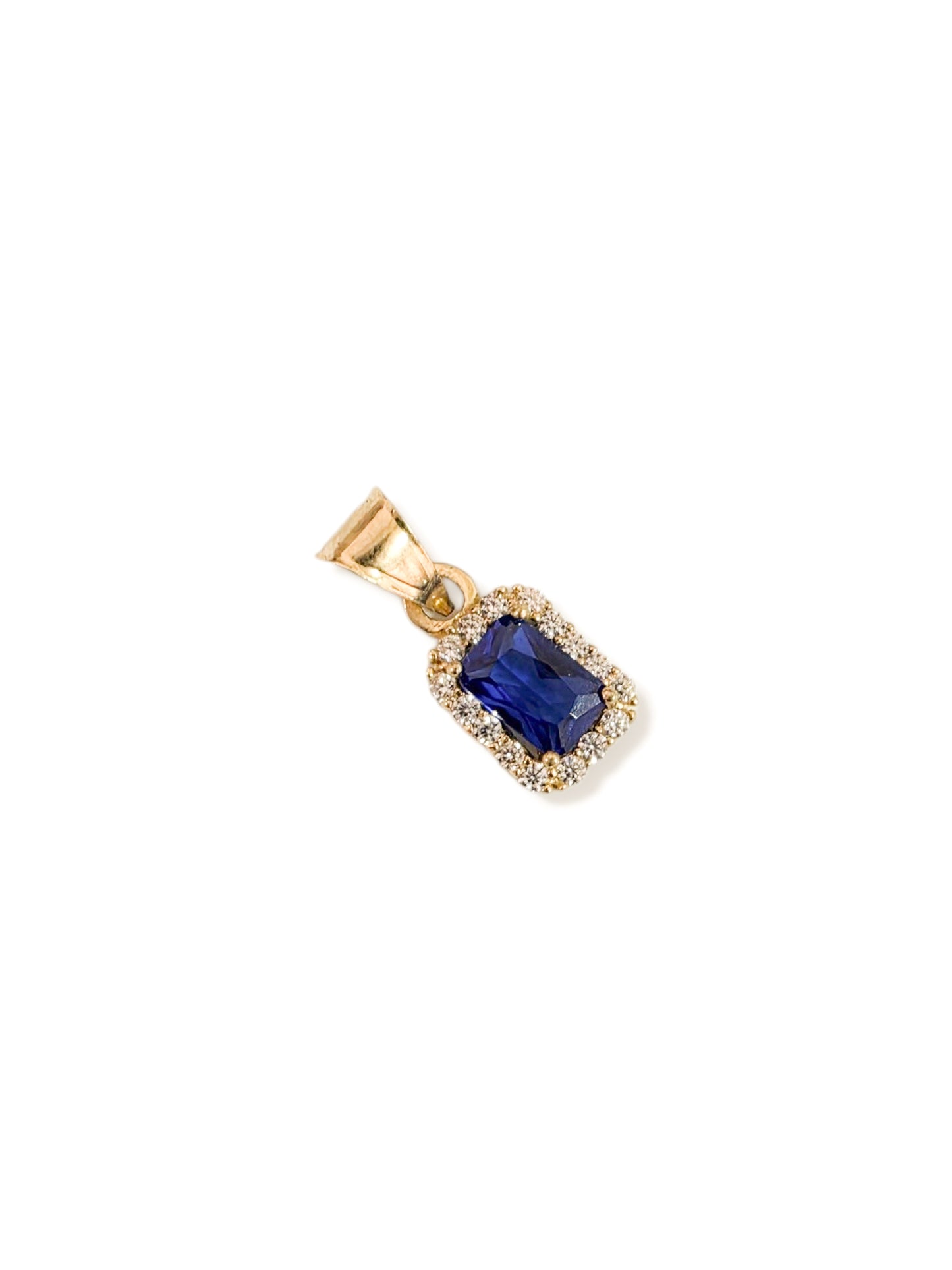 Dije corte esmeralda con zirconia azul oro 10k