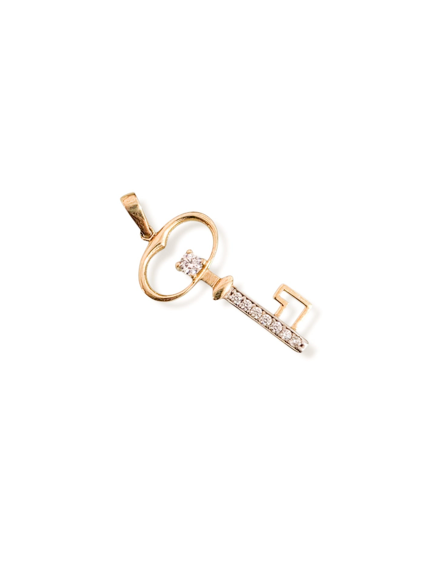 Dije llave con piedras oro 10k