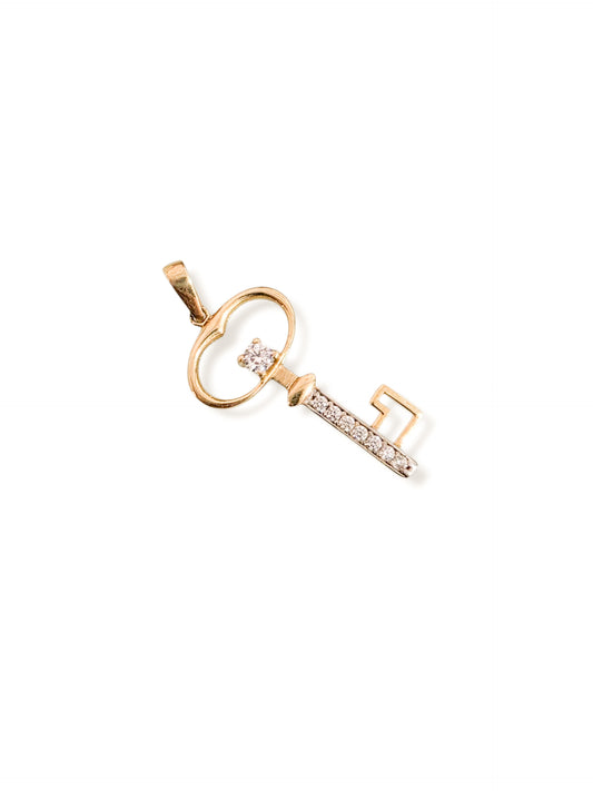Dije llave con piedras oro 10k