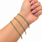 Pulsera tenis zirconia verde oro 10K