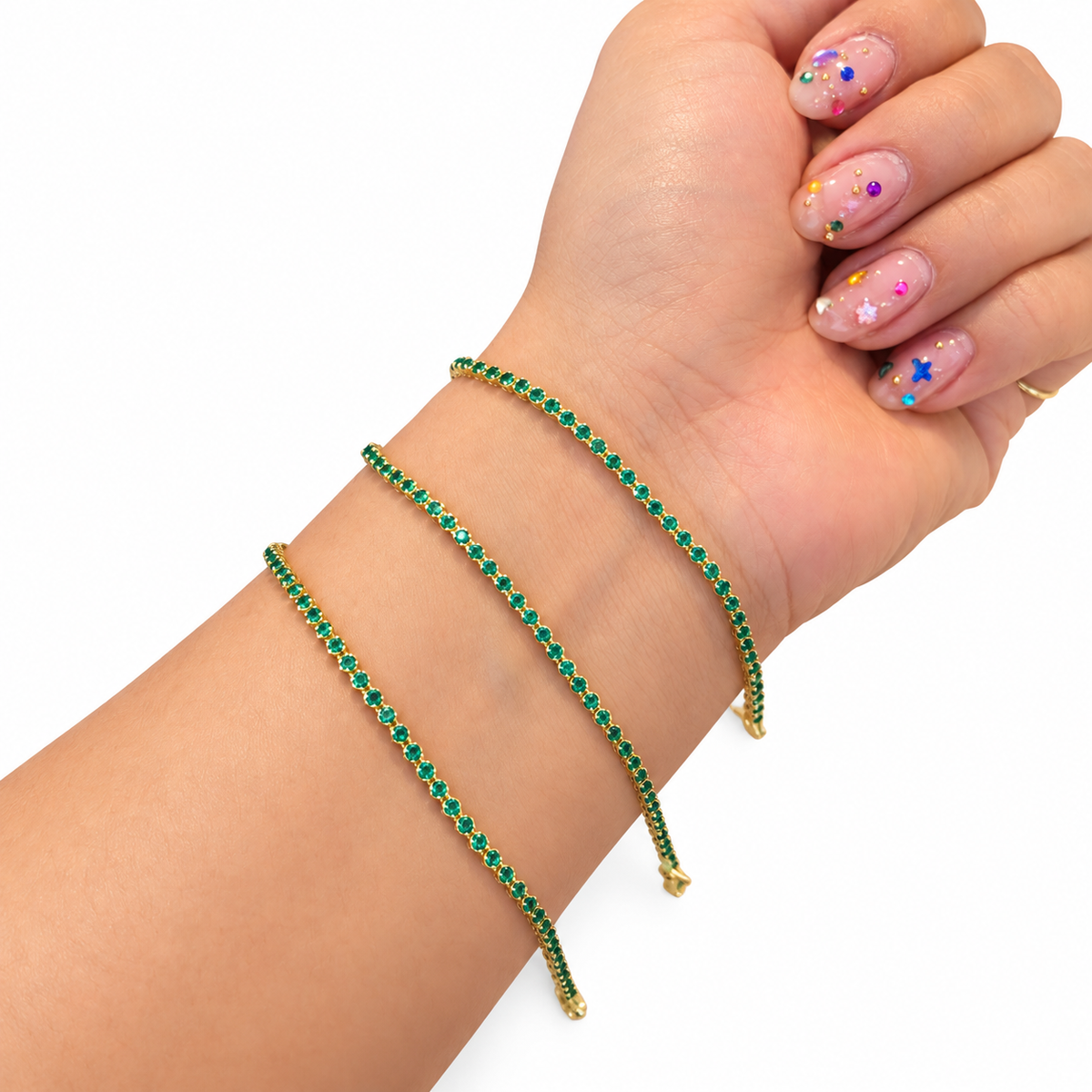 Pulsera tenis zirconia verde oro 10K
