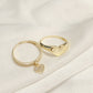 Anillo corazón con piedras con charm y corazón liso oro 10k dorado