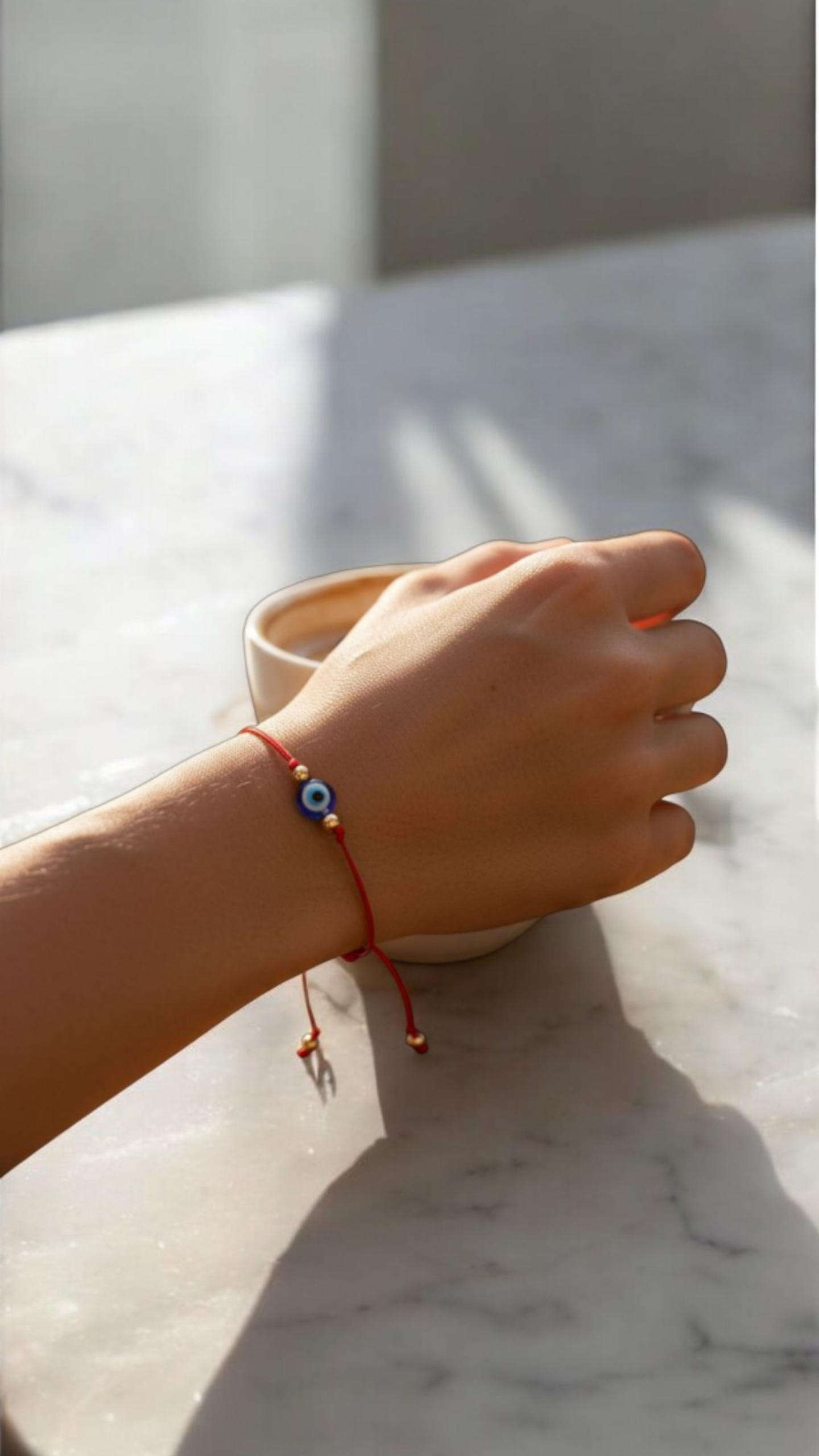 Pulsera de hilo rojo con ojito turco azul BIMETAL