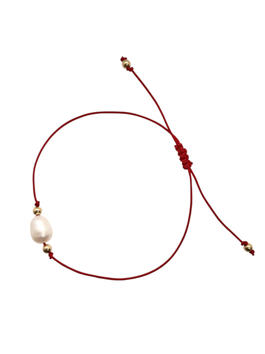 Pulsera de hilo rojo con Perla 1cm y 4 esferas bimetal 3mm