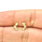Par de broquel curvo floral con circonia Oro 10K
