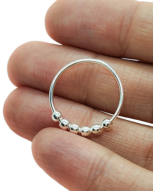 Anillo de bolitas giratorias (anti-estrés)