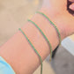 Pulsera tenis zirconia verde oro 10K