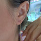 Par de Aretes broquel piedra natural rubí plata 925 baño de oro