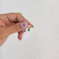 Dije corte oval con zirconia verde oro 10k