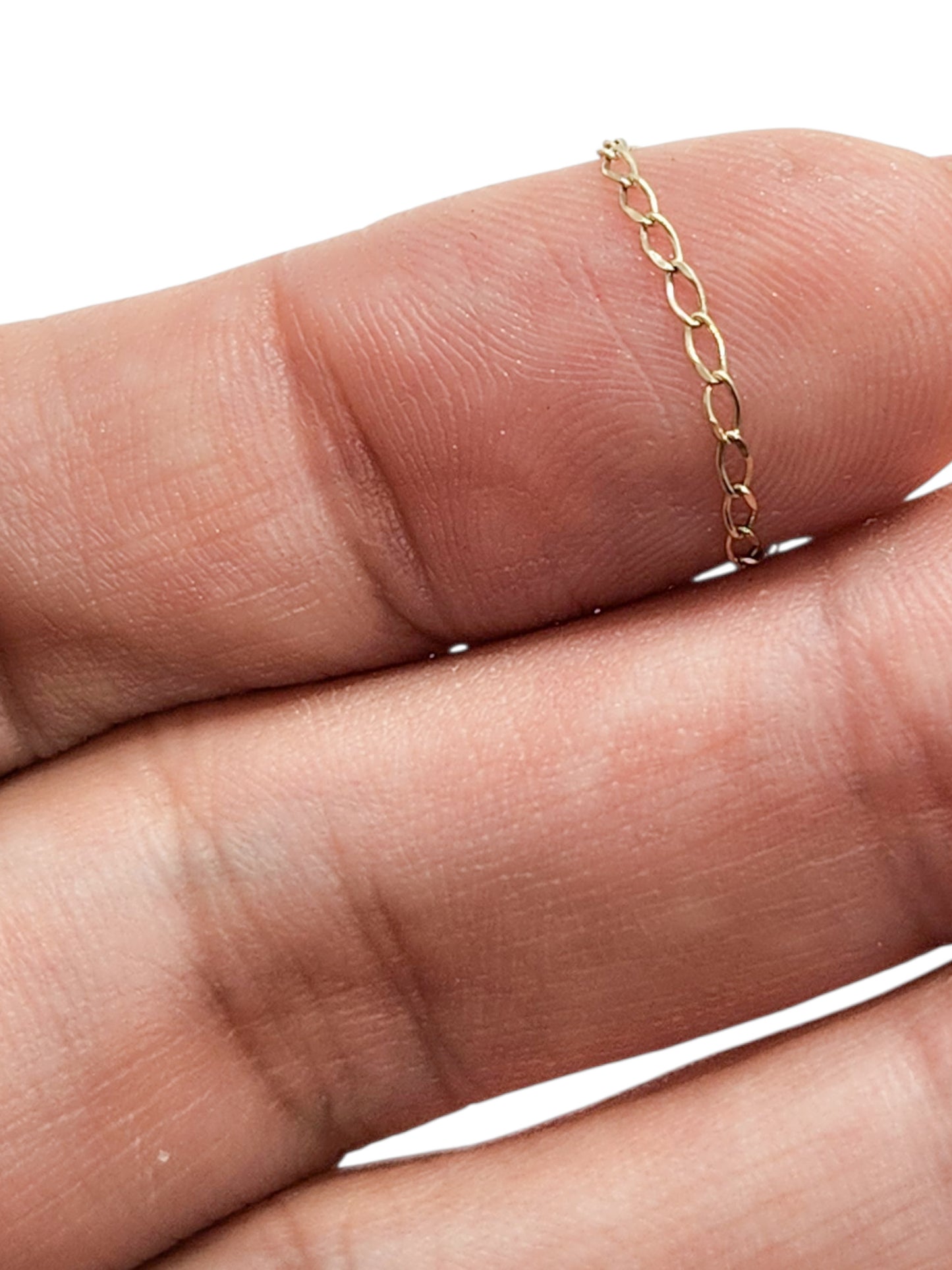 Anillo cadena semilla de melón oro 10k