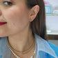 Aretes tu y yo esmeralda natural y diamante de laboratorio oro 10k