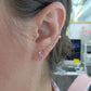 Aretes tu y yo alejandrina natural y diamante de laboratorio oro 10k