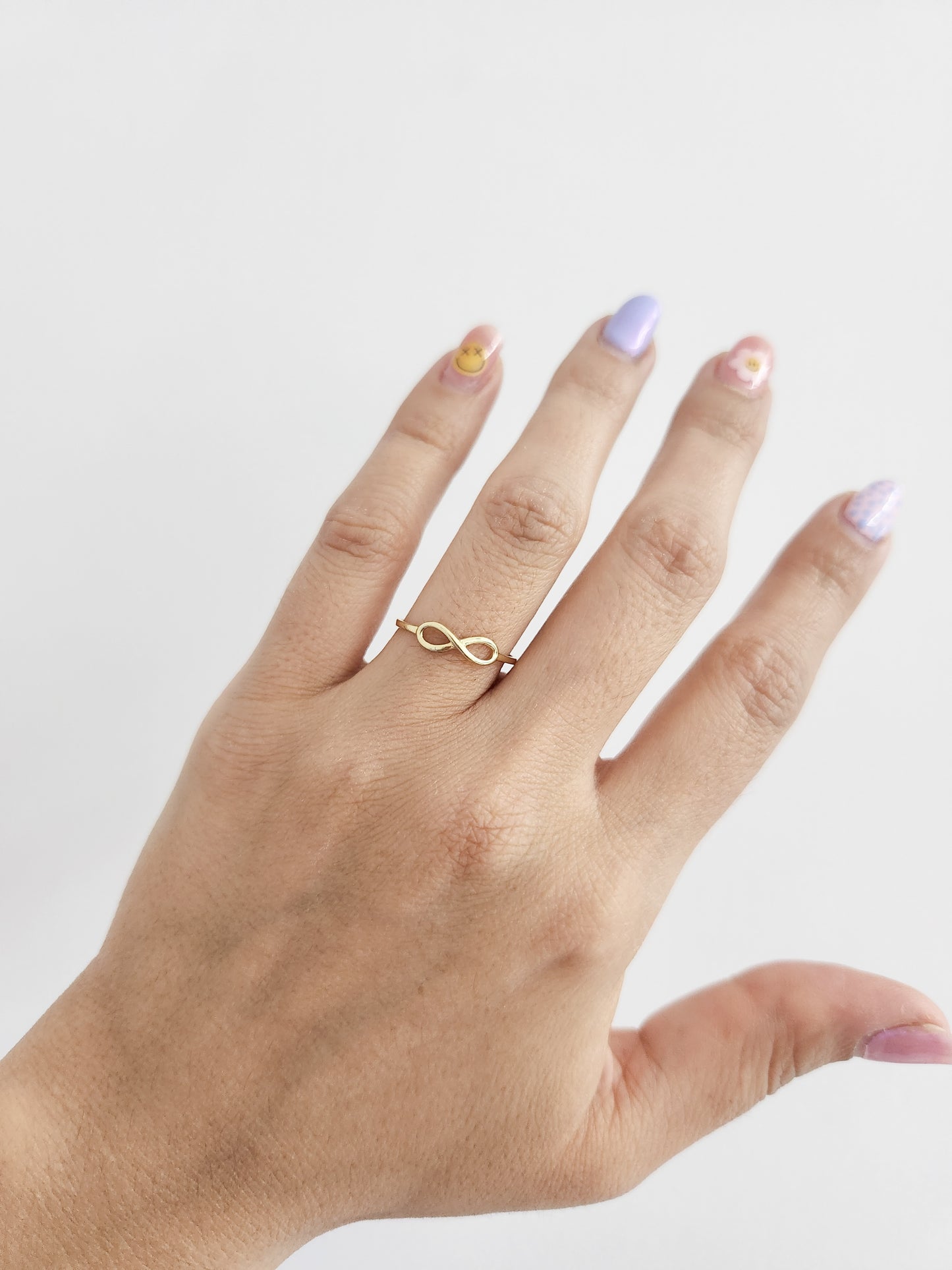 Anillo infinito contorno oro 10k