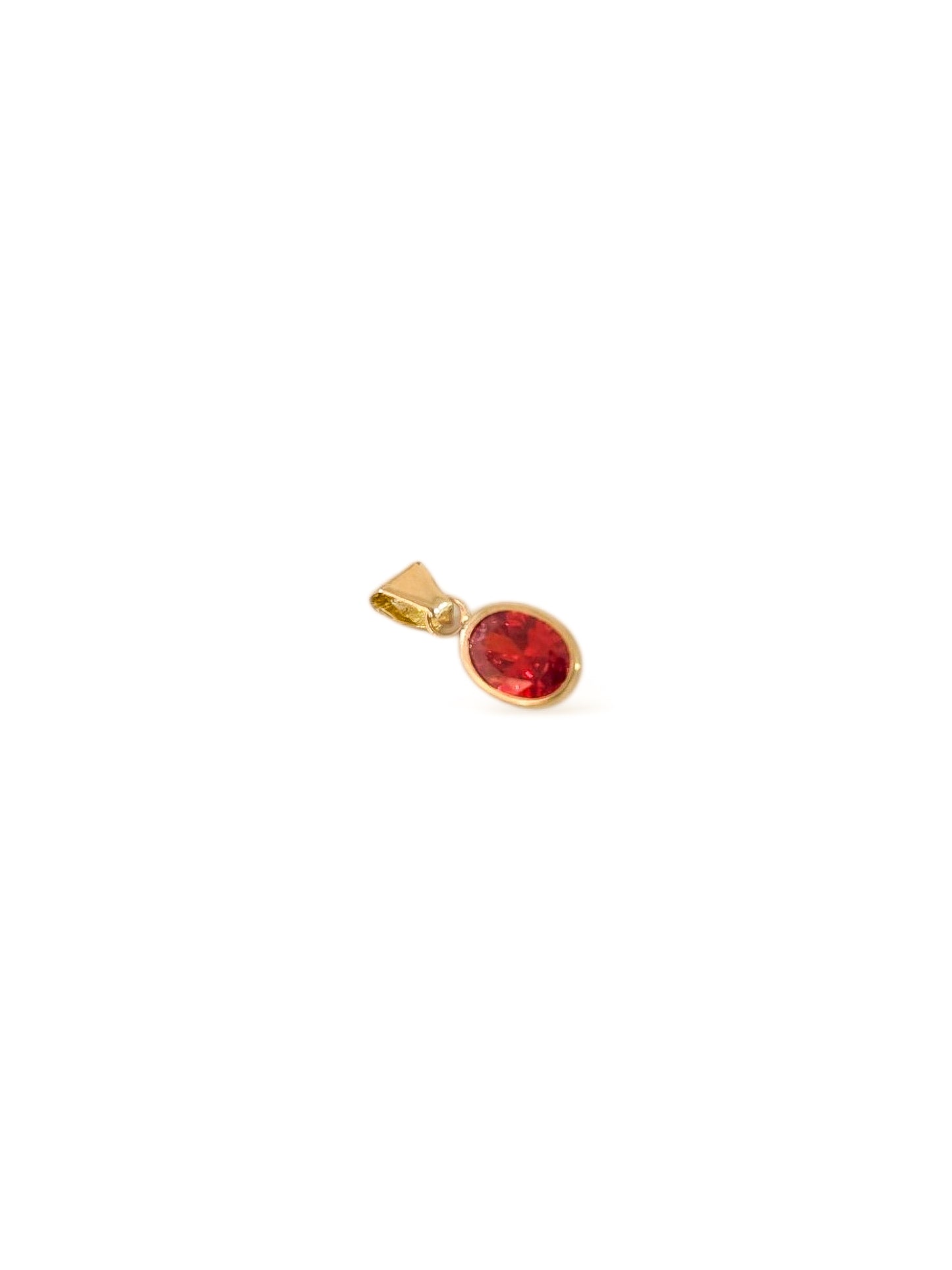 Dije corte oval con zirconia naranja oro 10k