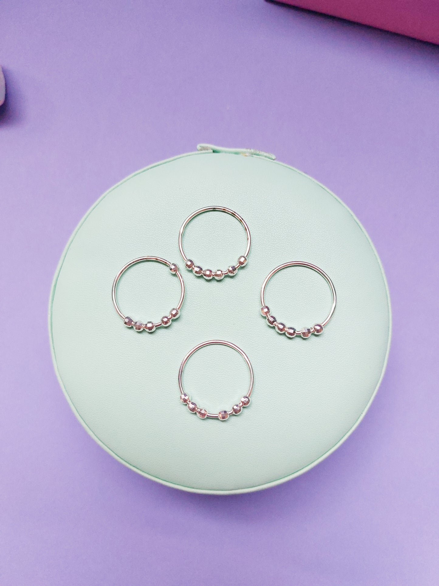 Anillo de bolitas giratorias (anti-estrés)