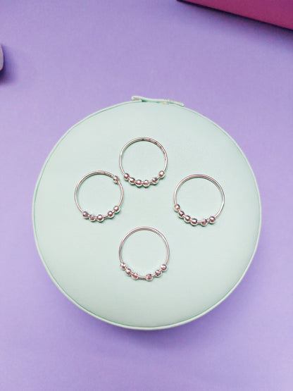 Anillo de bolitas giratorias (anti-estrés)