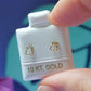 Par o pieza de Broquel osito silueta oro de 10k